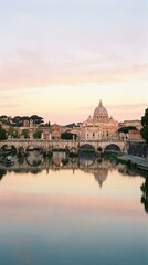Fototapeta premium Rome cityscape with St. Peter's Basilica dome reflected in Tiber River at sunset