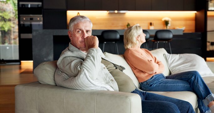 Man, ignore and senior couple in conflict for infidelity, silent treatment and thinking of divorce. Fight, pensioner and contemplating marriage in home for cheating, betrayal and unresolved dispute