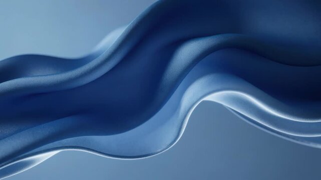 Soft flowing blue fabric texture with smooth folds and elegant wave patterns in gentle light