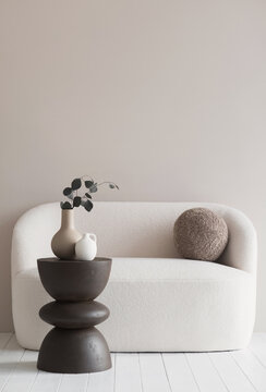 View of modern scandinavian style interior with sofa and trendy vase, Home staging and minimalism concept, empty beige wall 