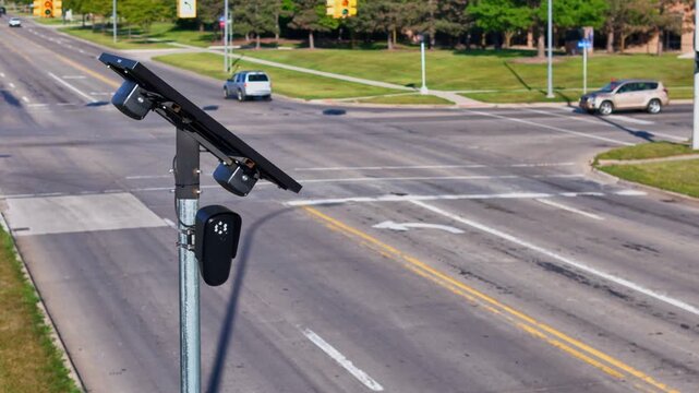 Flock cameras monitoring traffic at a street intersection in Brownstown, Michigan, USA