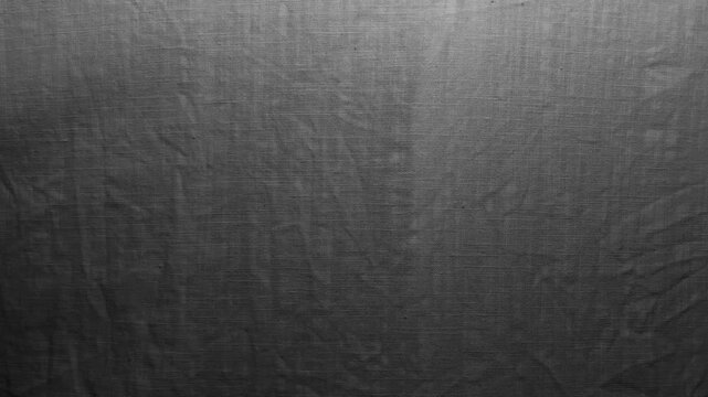 neon light transitions across textured linen fabric as pink blue violet red and white illuminate the dark background