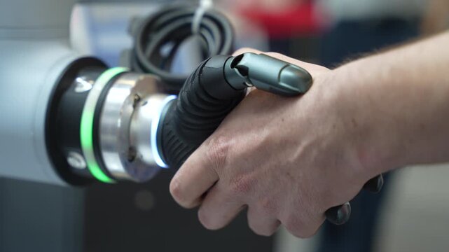 Robotic Finger Touching Human Hand in Close-Up, Symbolizing Human and Artificial Intelligence Connection