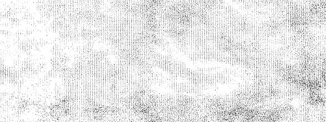 Fototapeta premium Grungy black and white texture with heavy noise and scattered halftone dots for distressed vintage effects in creative design projects or photography post-processing