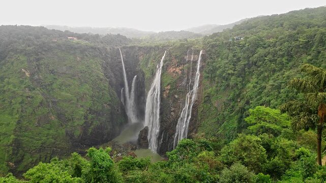 A wide view of Jog Falls showcasing cascading water and scenic natural landscape during monsoon