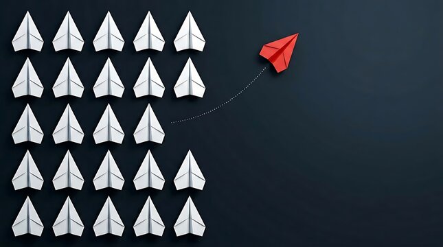 Red paper airplane breaks away from a group of white paper airplanes, symbolizing individuality and a new direction