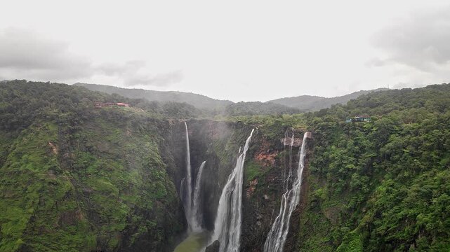 A wide view of Jog Falls showcasing cascading water and scenic natural landscape during monsoon