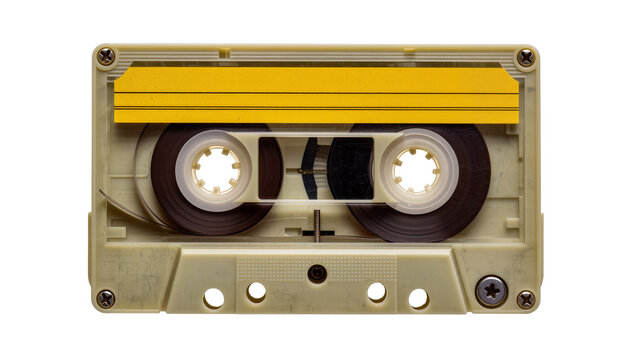 Vintage beige cassette tape with yellow label, isolated on transparent background