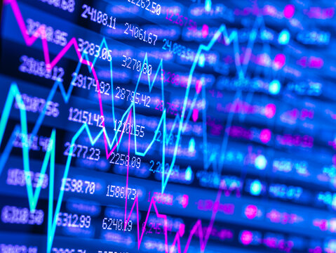Digital composite of two stock market data displays