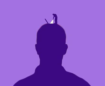 Concept of introspection with figure shining light into a mind
