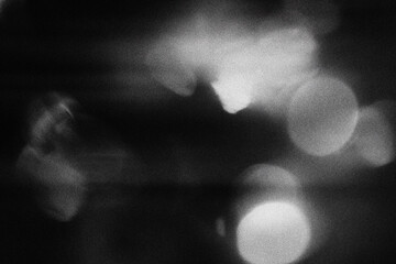 retro film overlay effect with scratch dust and light leaks, retro grain noisy film distressed texture light leak flare on black background, Black and white background © Uuganbayar