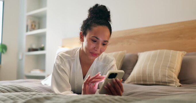 Woman, relax and typing in hotel room with phone, text message and social media update on vacation. Happy, person chill and browsing on bed with tech, holiday and website booking for accommodation.