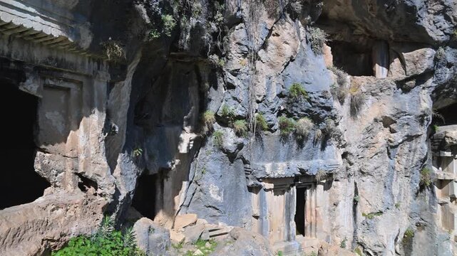 Lycian rock cut tombs at the ancient city of Pinara, Turkey