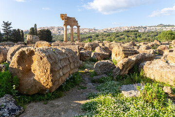 Naklejka premium Ancient Greek ruins at the Valley of the Temples in Agrigento overlooking the modern city