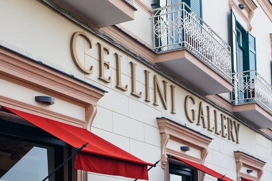 Pompei, Italy - 8. March 2026: Cellini Gallery sign on a classic building facade