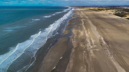 Fototapeta premium Aerial drone view of a sandy beach on the English Channel coast of Normandy, France. High quality photo
