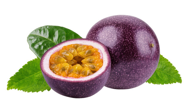 Whole and halved passion fruit with green leaves