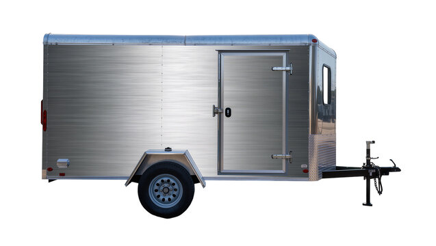 Silver enclosed cargo trailer with side door and hitch