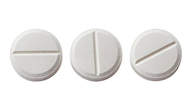 Three white round pills with score lines