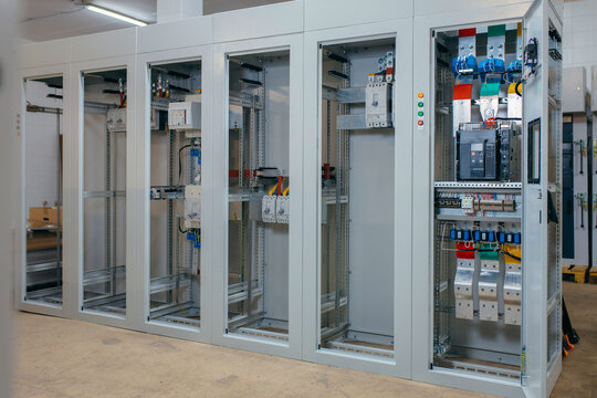 Electrical control cabinet with open door and wiring