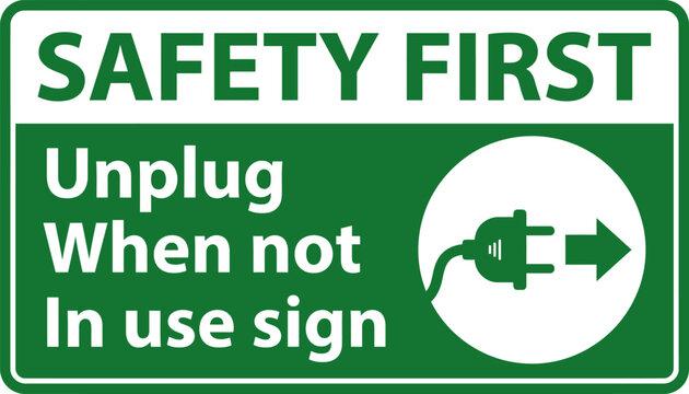 Green safety first unplug when not in use sign