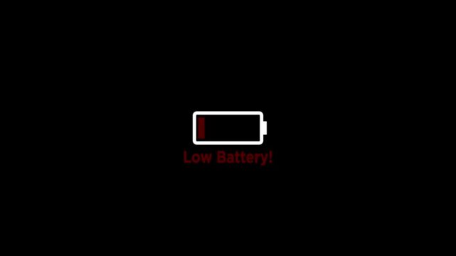 Animation featuring a low battery text icon against a black background.4k video .