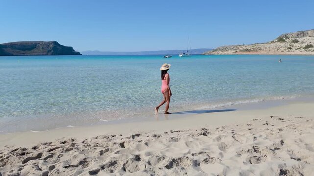Explore the stunning beauty of Simos Beach, where soft sand meets crystal-clear waters. A serene escape invites you to walk along the shore and soak up the sun on Elafonisos Island Greece.