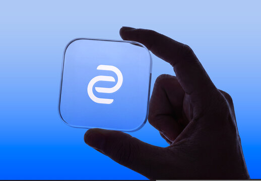 Hand Holding Transparent Glass App Icon Mockup