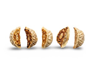 Fototapeta premium Three golden granola energy bars stacked on white background minimalist food photography