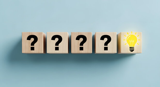 Wooden cubes with question marks and a glowing lightbulb symbolizing ideas or solutions