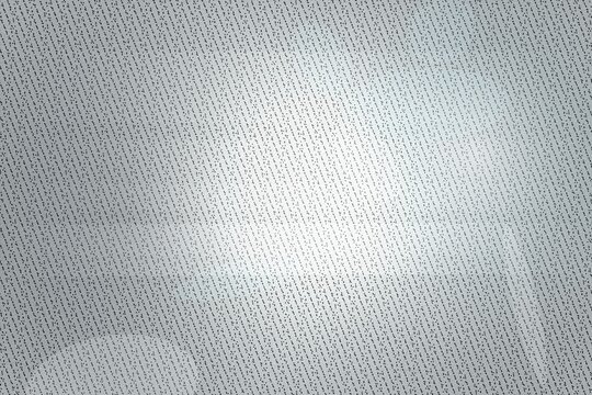 Close-up of a light blue denim fabric texture with a subtle pattern