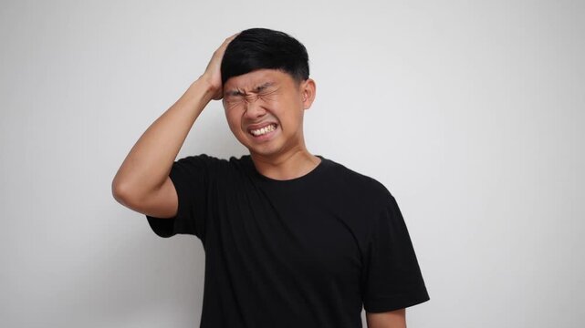 Man suffering from severe headache and stress