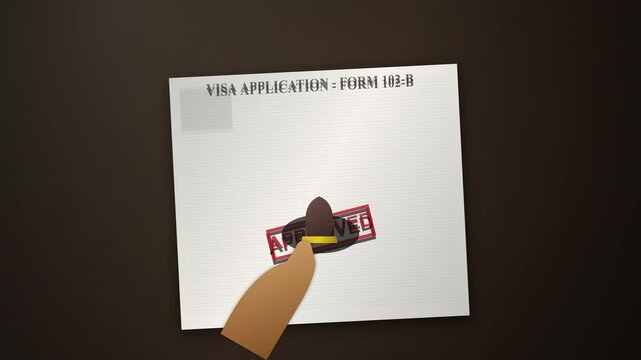 Visa application form being stamped with approval by a hand.
