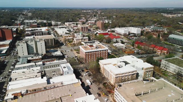 Downtown Athens Georgia with historic courthouse and tree lined neighborhoods from above