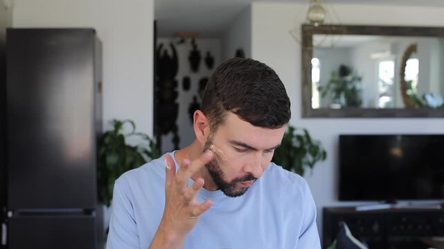 Handsome Man Applying Bronzer Foundation 