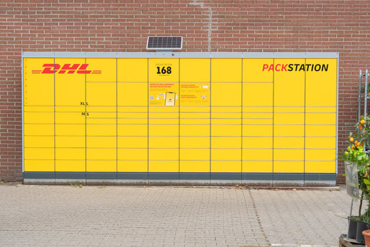 Bad Hersfeld, Germany, 06.05.2026, DHL Packstation yellow self service locker. Automated parcel delivery station terminal