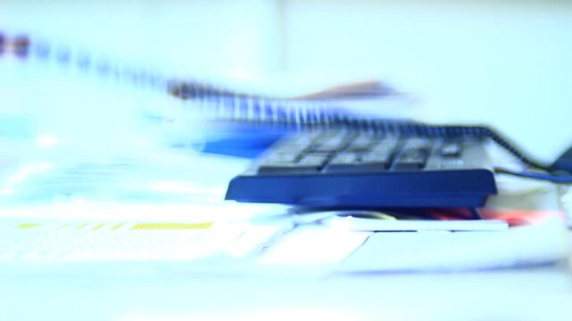Using phone in the office.