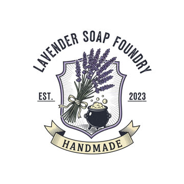 Handmade lavender soap foundry logo featuring lavender sprigs and cauldron.