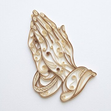 Praying hands made of quilling paper art