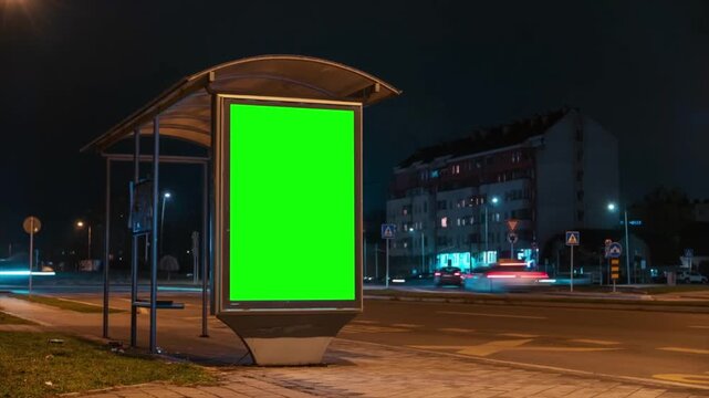 Mockup billboard with green screen at bus stop, urban street advertising display at night, chroma key outdoor marketing background, 4k video