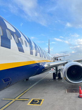 Side view of a Ryanair passenger aircraft on the apron during boarding or disembarkation. Rome, Italy - June 9, 2026.
