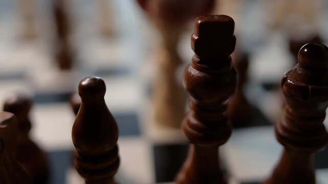 Chess game focus pulling from pawn to king