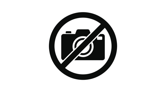 Black camera icon featuring a bold diagonal line across the center indicating a strict prohibition on photography within this specific public or private restricted area