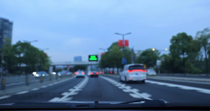 Driving car in Chengdu city, China
