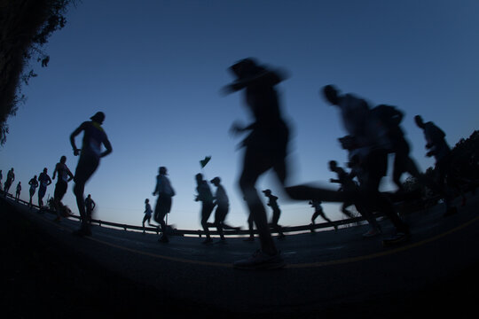 Ultra Marathon Runners Closeup Silhouettes Running Motion Blurs Dawn