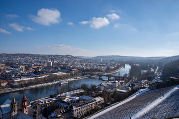 Fototapeta premium Würzburg cityscape with Main River and snow-covered vineyard