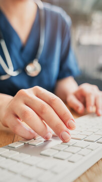Healthcare professional working on patient documents