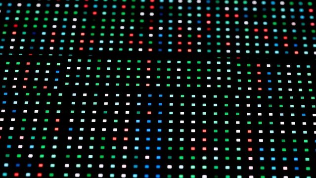 Technology - Close Up Macro View of Colorful RGB LED Matrix Panel Pixels on Black Background