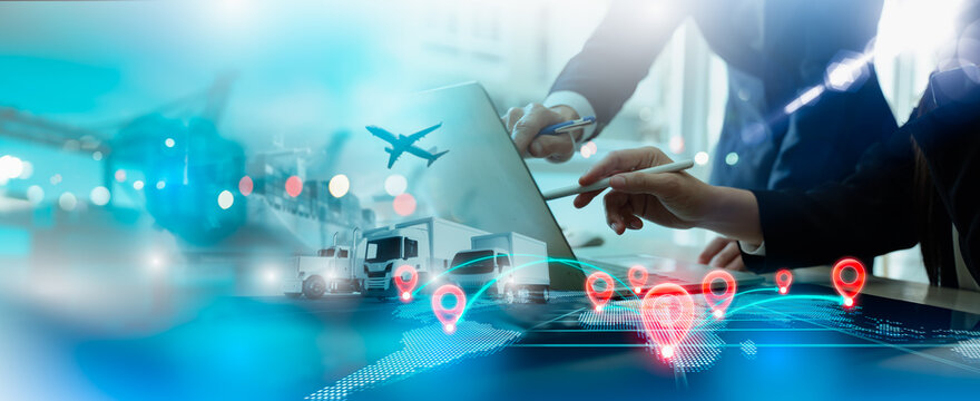 Businessman using laptop to manage smart logistics and transportation network,distribution,representing integrated warehousing operation service,cyber security data cargo tracking,transportation flow