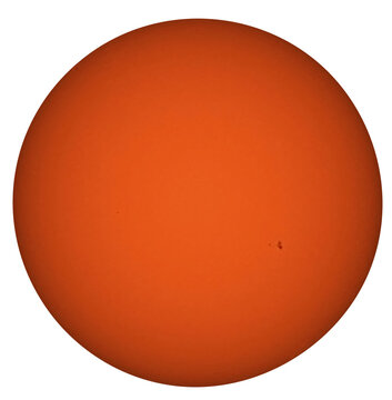 Sun in white light, revealing its bright orange photosphere with a few small dark spots visible near the right edge.